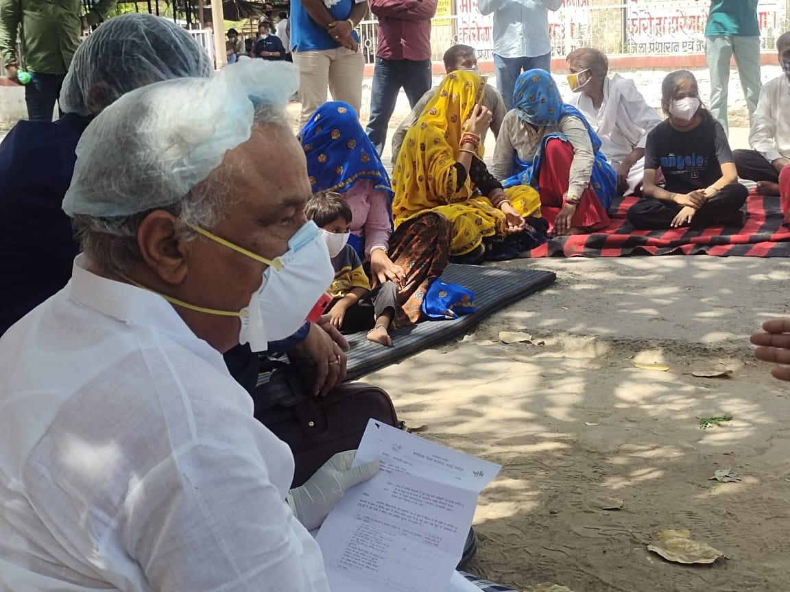 Dr.Kirodi sitting on protest to provide support to children orphaned by covid